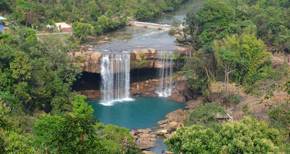 Krang Suri Waterfalls – A Curtain of Blue Fire